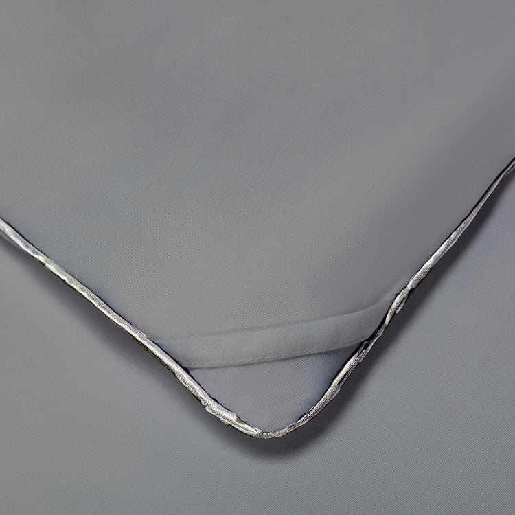 Graphite Original Performance All Season Comforter detail shot showing the duvet cover ties. #choose-your-color_graphite