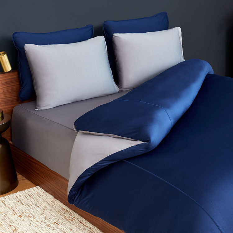 Duvet cover on bed in bedroom environment #choose-your-color_navy-graphite