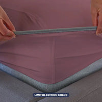 Cherry Blossom fitted sheet shown on deep pocket mattress bed in bedroom environment. #choose-your-color_cherry-blossom