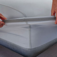 Pearl Blue fitted sheet elastic shown on deep pocket mattress in bedroom environment. #choose-your-color_pearl-blue