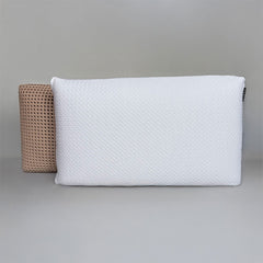 SleepScent Pillow featured in Contour version with cover pulled back showing the breathable foam which has holes allowing air flow.