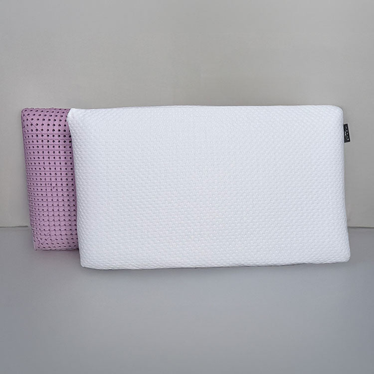 SleepScent Pillows featured in Regular version with pillow cover pulled away to reveal purple foam insert with holes for breathability and airflow.