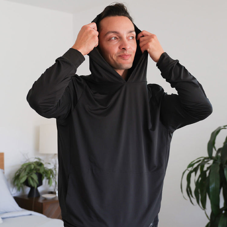 Model wearing black SHEEX Men's Hoodie #choose-your-color_black