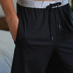 Model wearing SHEEX Men's Lounge Short in Black #choose-your-color_black