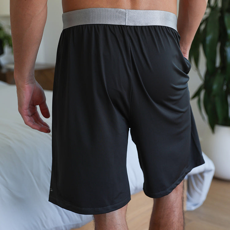 Model wearing SHEEX Men's Lounge Short in Black #choose-your-color_black