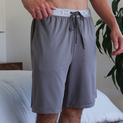 Model wearing SHEEX Men's Lounge Short in Graphite #choose-your-color_graphite