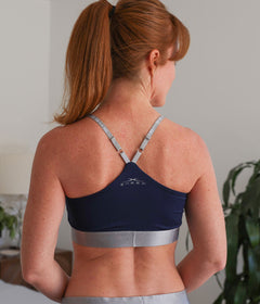 Model wearing the SHEEX Women's Bra Top in Navy #choose-your-color_navy