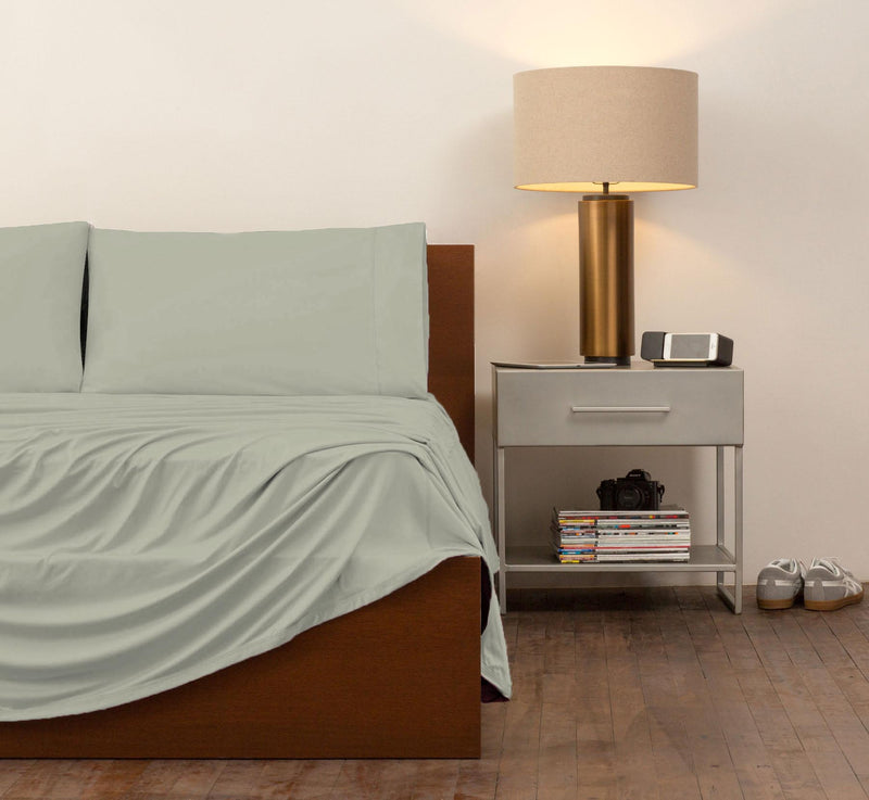 reNEWed Sheet Set on bed in room environment, Sage Mist #choose-your-color_sage-mist