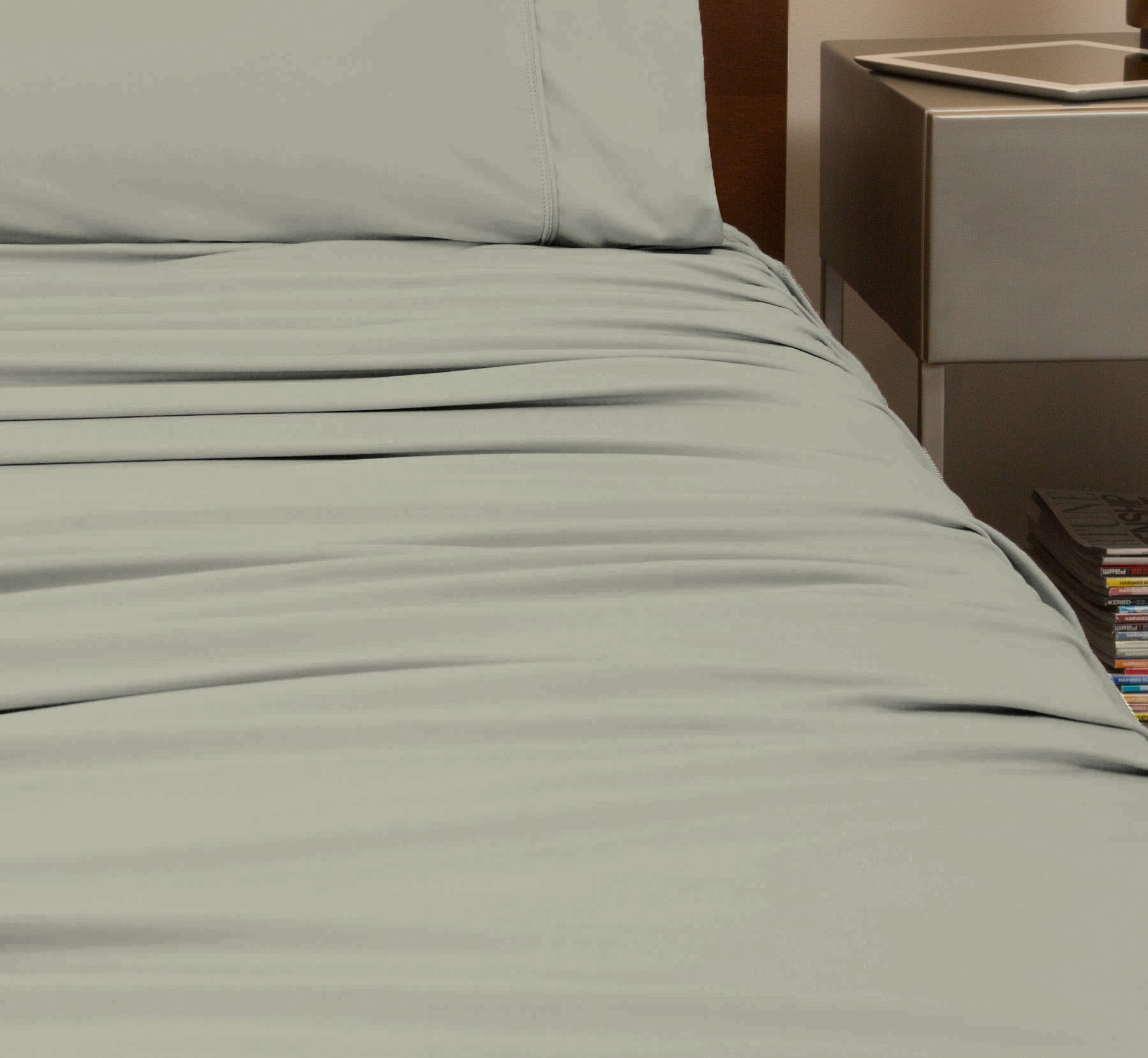 reNEWed Sheet Set on bed in room environment, Sage Mist #choose-your-color_sage-mist