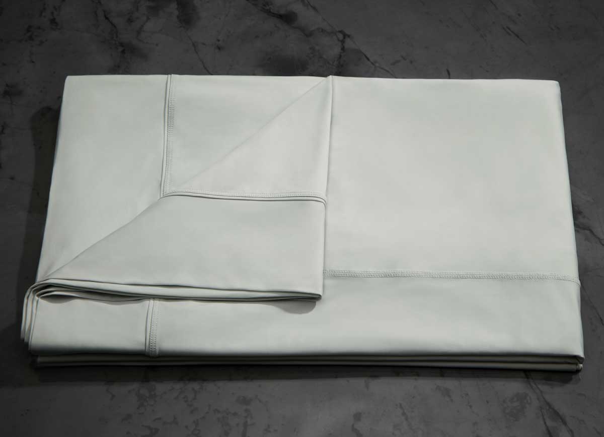 MIDNIGHT LABEL Flat Sheet shown in mist gray, folded #choose-your-color_mist-gray