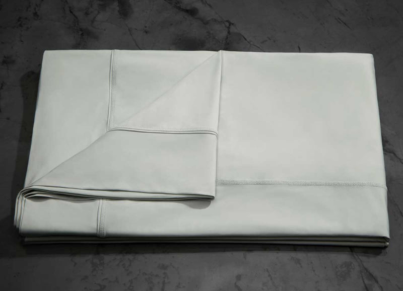 MIDNIGHT LABEL Flat Sheet shown in mist gray, folded #choose-your-color_mist-gray