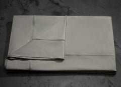  MIDNIGHT LABEL Flat Sheet shown in stone, folded #choose-your-color_stone
