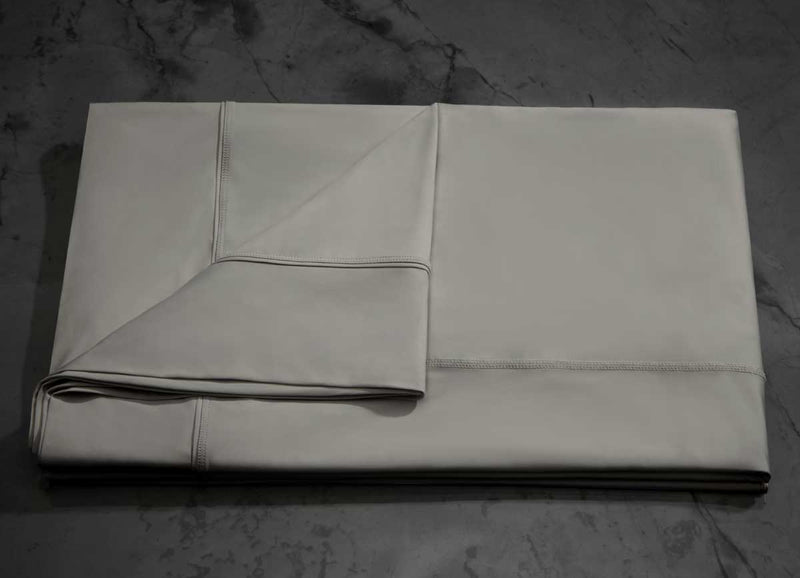  MIDNIGHT LABEL Flat Sheet shown in stone, folded #choose-your-color_stone