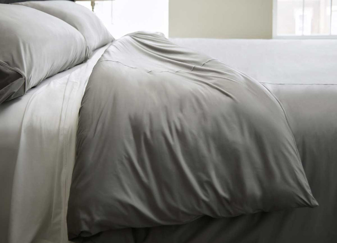 Lifestyle of Midnight Label Duvet Cover shown on bed #choose-your-color_stone