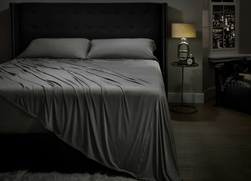 Lifestyle image of MIDNIGHT LABEL Flat Sheet shown in stone  #choose-your-color_stone