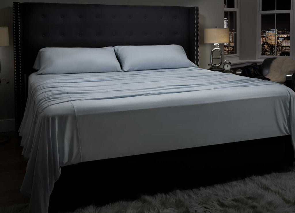 Midnight Label Sheet Set shown on bed #choose-your-color_spa-blue