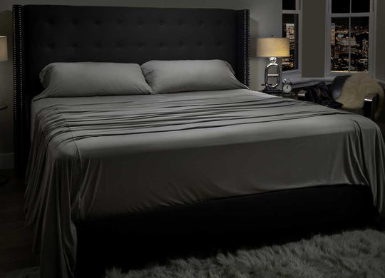 Midnight Label Sheet Set shown on bed #choose-your-color_stone