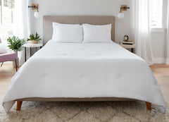 Original Performance All Season Comforter on bed