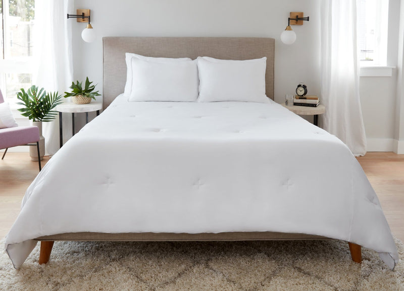Original Performance All Season Comforter on bed