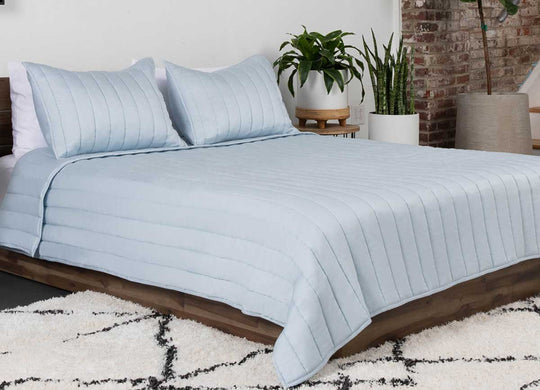 Arctic Coverlet Lifestyle with Bed #choose-your-color_light-blue