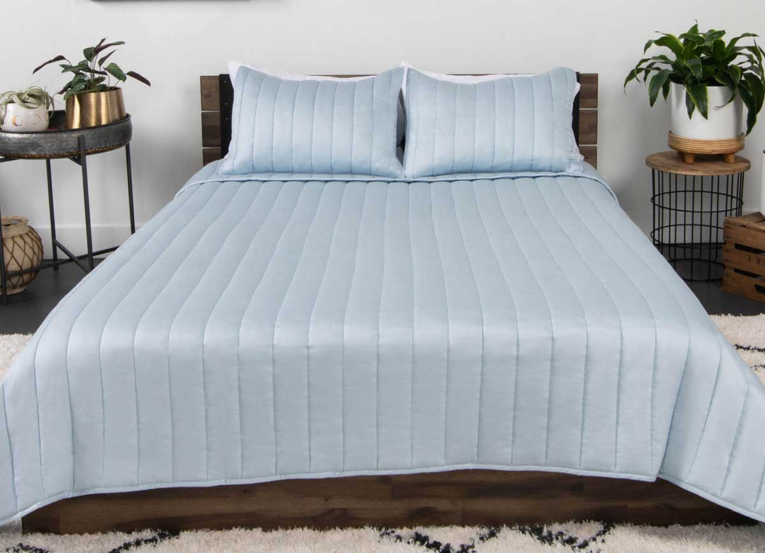 Arctic Coverlet Lifestyle with Bed #choose-your-color_light-blue