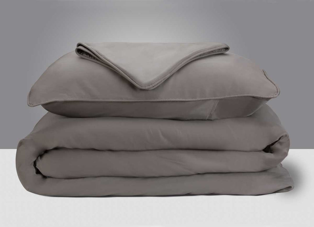 Arctic Aire Duvet Set Image Shown Folded and Stacked in Charcoal #choose-your-color_charcoal