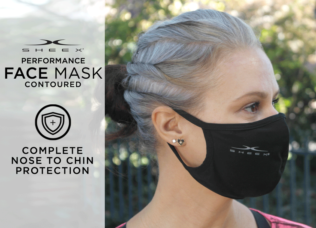Model wearing SHEEX Performance Contoured Face Mask in Black#choose-your-color_soft-blue