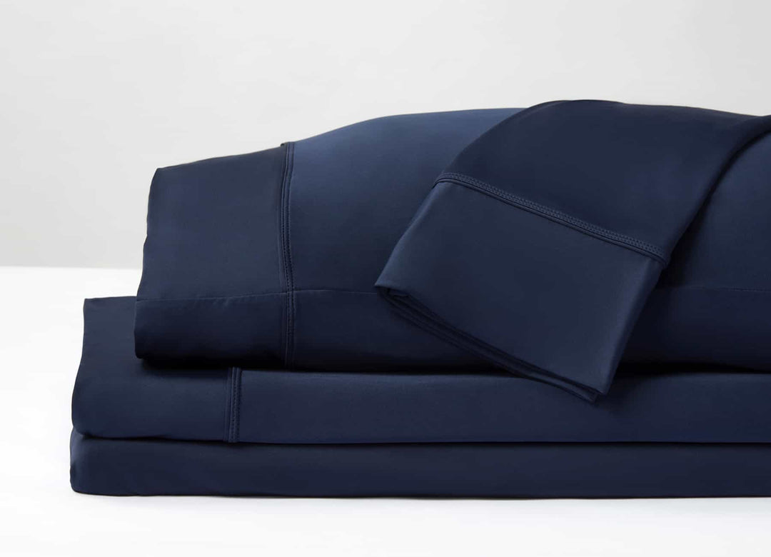 Original Performance Sheet Set Image Shown Folded and Stacked in Navy #choose-your-color_navy