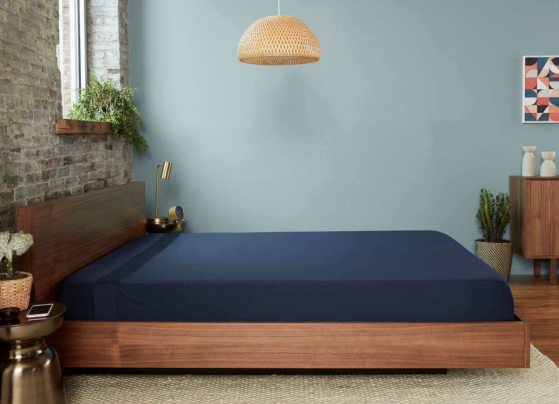 Original Performance Flat Sheet in Navy on bed #choose-your-color_navy