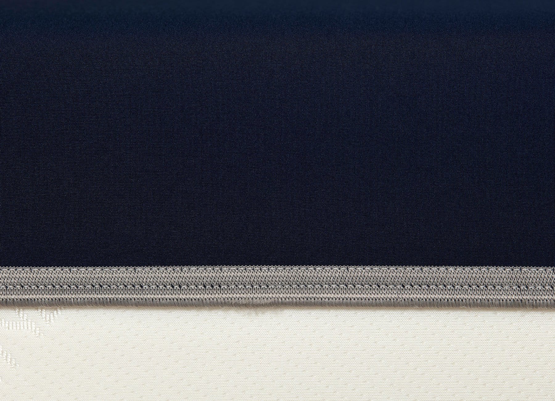 Original Performance Fitted Sheet on bed in Navy #choose-your-color_navy