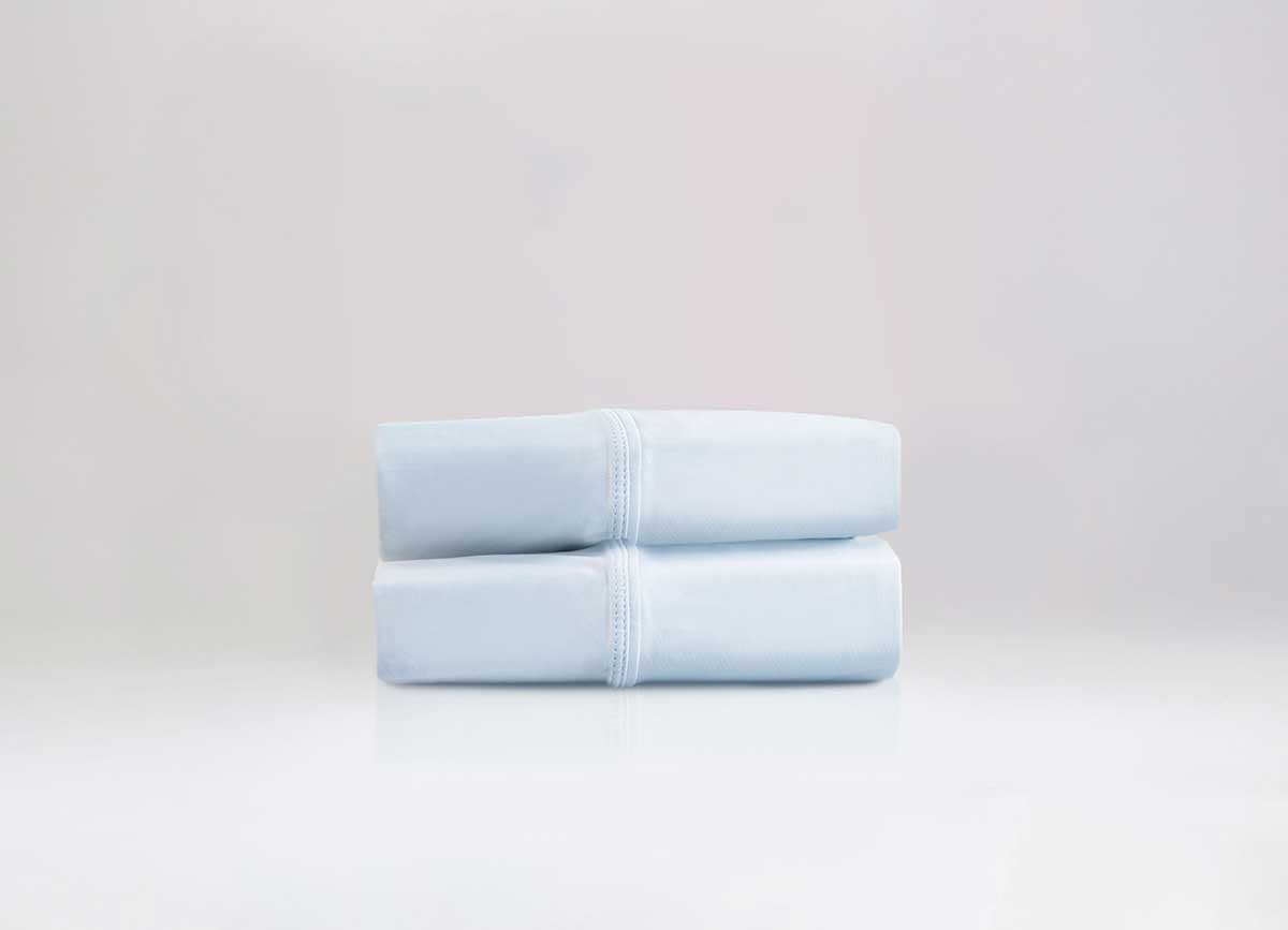 Active Comfort Pillowcases shown in Blue Frost in stack #choose-your-color_blue-frost