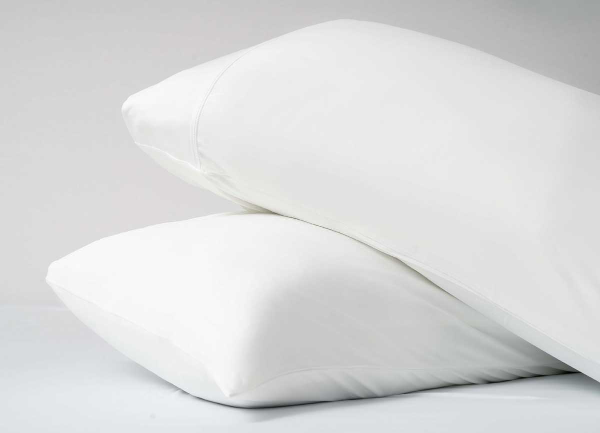 Active Comfort Pillowcases shown in Bright White shown on pillows #choose-your-color_bright-white