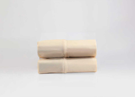 Active Comfort Pillowscases shown in Cream in stack #choose-your-color_cream