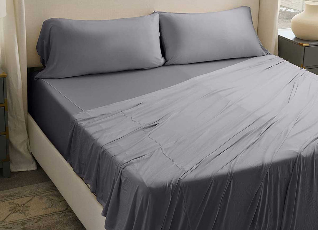 Active Comfort Pillowcases shown on bed in Pewter #choose-your-color_pewter