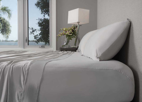 Active Comfort Pillowcases shown in Silver Cloud on bed #choose-your-color_silver-cloud