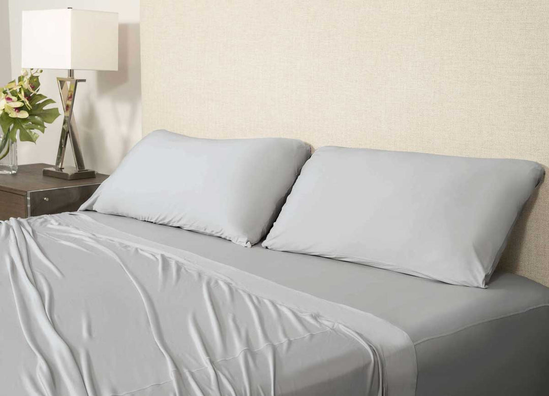 Active Comfort Pillowcases shown in Silver Cloud on bed #choose-your-color_silver-cloud