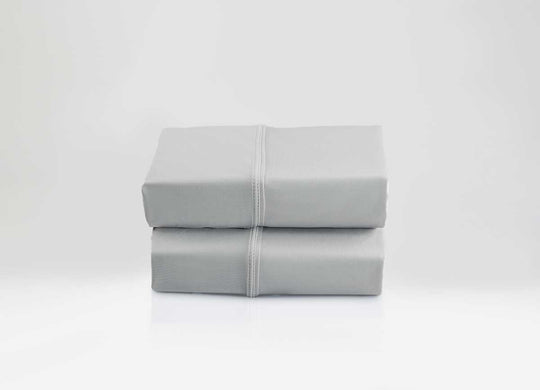 Active Comfort Pillowcases shown in Silver Cloud in stack #choose-your-color_silver-cloud