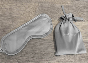 Grey Sleep mask and Pouch on table. #choose-your-color_graphite