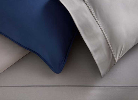 Studio Tech Bedding in navy and graphite in room environment #choose-your-color_navy-graphite