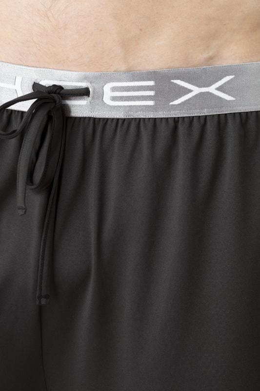 Model wearing SHEEX Men's Lounge Short in Black #choose-your-color_black