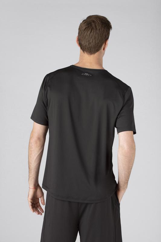 Model wearing SHEEX Men's Short Sleeve Tee in Black #choose-your-color_black