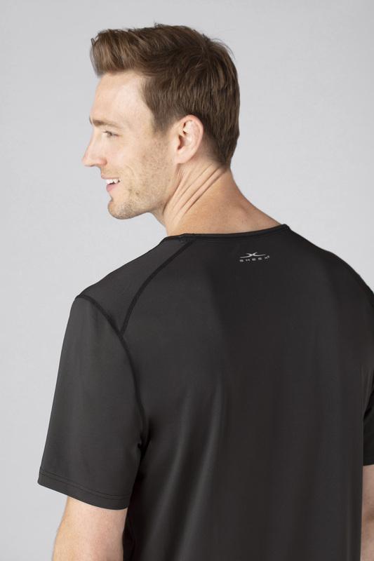 Model wearing SHEEX Men's Short Sleeve Tee in Black #choose-your-color_black