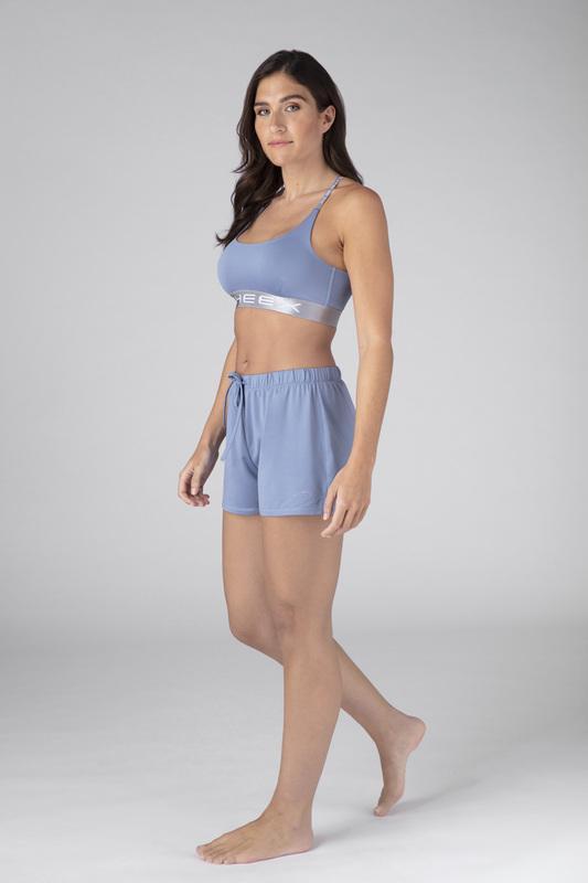 Model wearing the SHEEX Women's Bra Top in Light Blue  #choose-your-color_light-blue