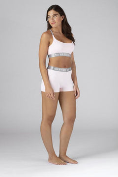 Model wearing the SHEEX Women's Bra Top in Blush Pink  #choose-your-color_blush-pink