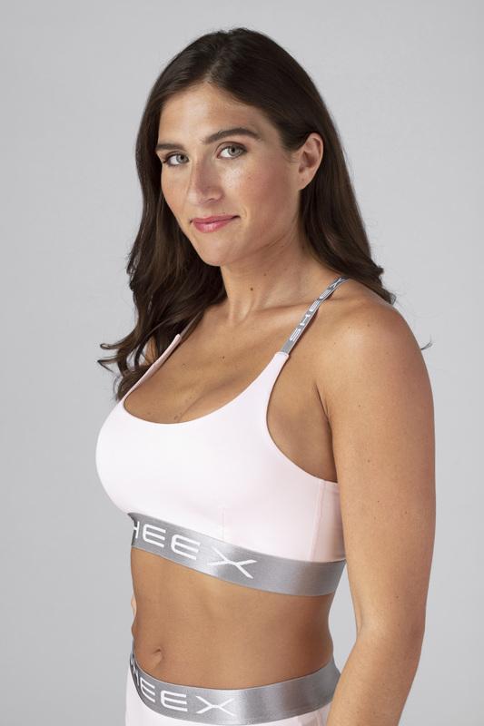 Model wearing the SHEEX Women's Bra Top in Blush Pink  #choose-your-color_blush-pink
