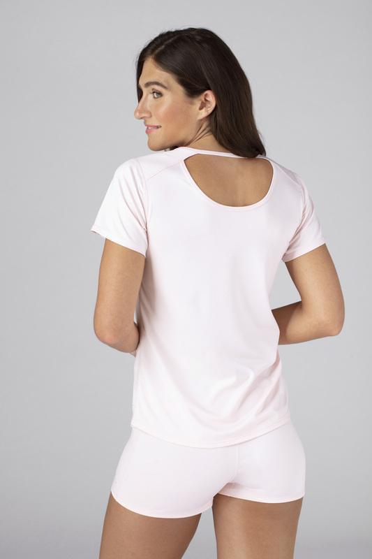 Model wearing the SHEEX Women's Cutout Tee in Blush Pink #choose-your-color_blush-pink